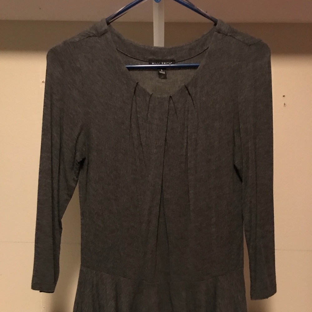 Gray Blouse with peplum type bottom.